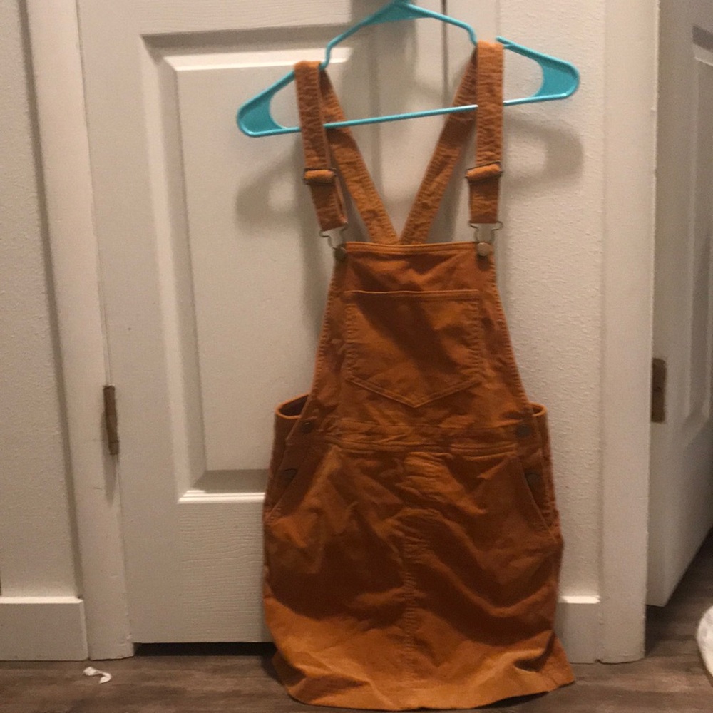 Never worn still has tags overall dress